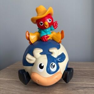 Bright Starts Baby Toy Rolling Bull Riding  Cowboy Chicken Music